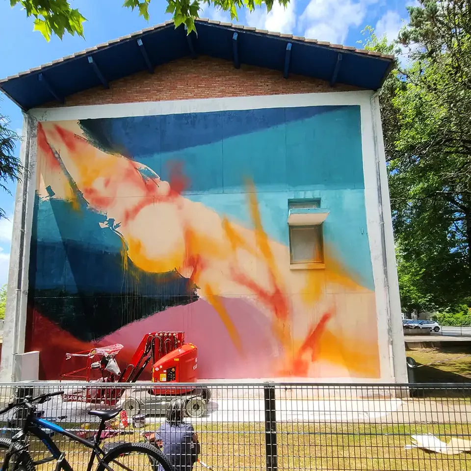 Fresque de street art par Saïr 777 pour le festival Muralis.